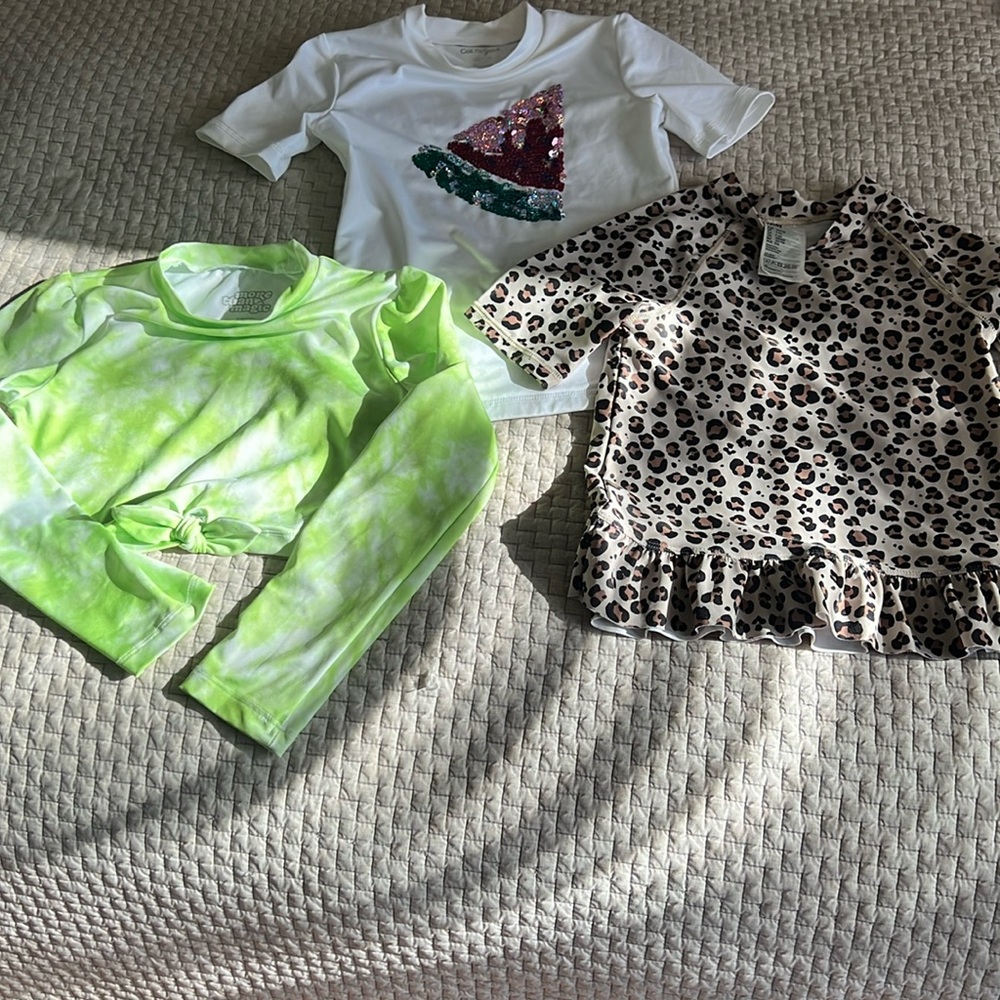 Girl’s swim shirts. Size 4-6x
